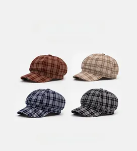 Collage of four checkered newsboy caps in red-brown, khaki, dark blue, and grey-black tones