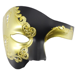 Dettaglio della maschera veneziana oro e nera con decorazioni di note musicali