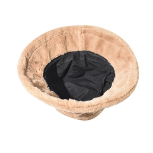 Detailed view of camel faux fur bucket hat with thick plush texture and black lining