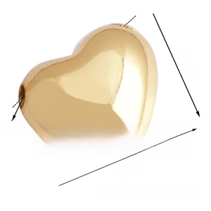 Macro detail of 15mm golden heart charm bead with 2.5mm hole for DIY jewelry making