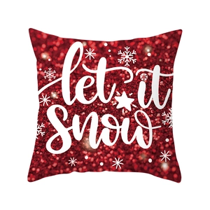 Red Christmas pillow cover with white Let It Snow lettering and snowflake glitter design