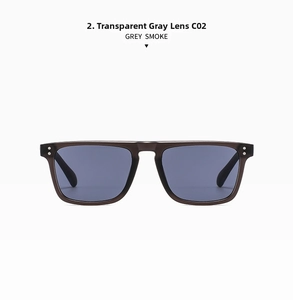 Detail of transparent grey square sunglasses with smoke lenses and silver rivet accents