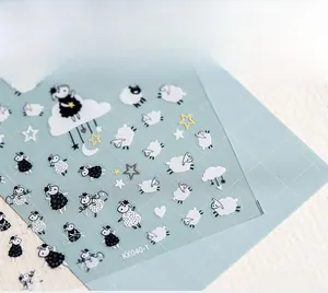 Detailed macro view of KX040-1 thin 5D nail stickers with cartoon sheep and cloud patterns