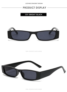 Macro view of retro small square bright black frame sunglasses with dark gray lenses