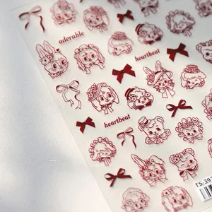 Detail of vintage hand-drawn pet nail stickers with cute dogs and red bows