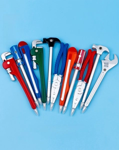 Close-up of diverse creative tool-shaped ballpoint pens with a 0.5mm bullet tip detail