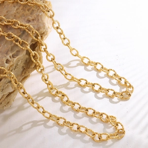 Minimalist thick chain necklace in 18K gold-plated titanium steel on a stone
