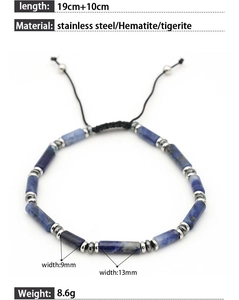 Detail of adjustable tiger eye stone bracelet with stainless steel beads and woven cord