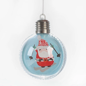Clear Christmas ball ornament featuring Santa Claus skiing pattern with a silver hanging cap