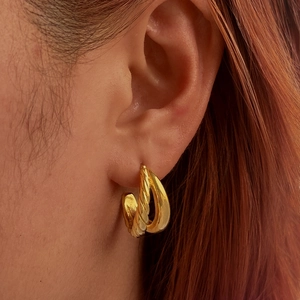 Elegant 18K gold plated multi-layer twisted hoop earrings for women on model