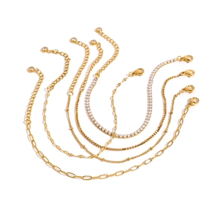 Set of gold stainless steel bracelets with zirconia accents in various chain styles