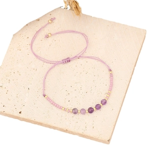 Handmade Bohemian natural stone bead bracelet with purple amethyst and woven cord detail