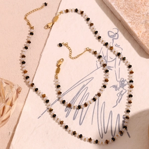 Tiger eye and white stone beaded necklace and bracelet set in 18K gold plated steel