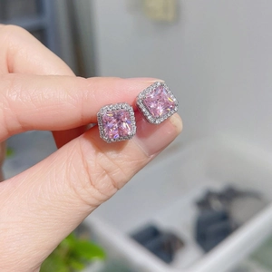 Elegant square pink ruby studs with halo pavé diamonds on polished silver setting