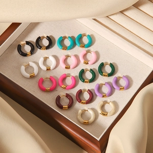 Multi-colored enamel hoop earrings in 18K gold plated stainless steel displayed in a box