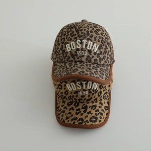 Detailed view of kids leopard print baseball caps featuring Boston 1630 embroidery