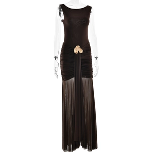 Detail of ruched waist with golden flower buckle on sheer brown maxi dress