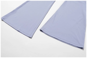 Close-up of light purple yoga pants flare hem with professional double-needle stitching