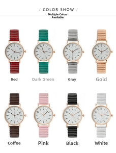 Detailed view of elastic band watches in eight colors with rose gold cases and white dials