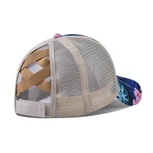 Detail of floral baseball cap with breathable mesh and elastic criss-cross ponytail opening