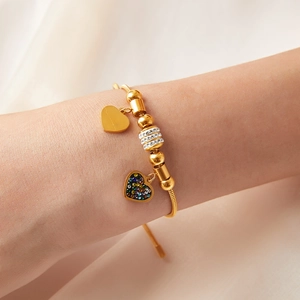 18K gold plated heart charm bracelet with zircon stones on a gold snake chain