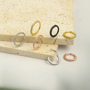 Hinged stainless steel nose rings with sparkling zircon in gold, silver, and black finishes