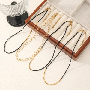Set of minimalist gold plated stainless steel necklaces with black spinel beads