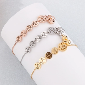 Three minimalist copper coin bell anklets in rose gold, silver, and gold stainless steel