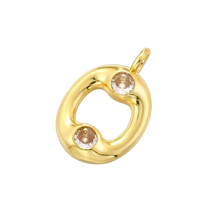 Detail of 18K gold plated letter O pendant featuring bamboo texture and clear crystals