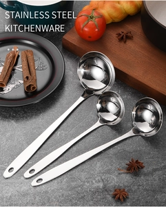 Three-piece stainless steel long handle soup ladles set on a dark stone countertop