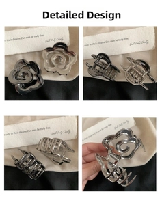 Detail of rose metal hair claw clips in silver and charcoal with strong spring mechanism