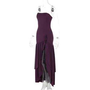 Detail view of purple strapless evening dress featuring an asymmetrical ruffled hemline