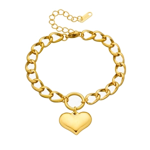 Gold stainless steel chunky Cuban chain bracelet featuring a large heart pendant