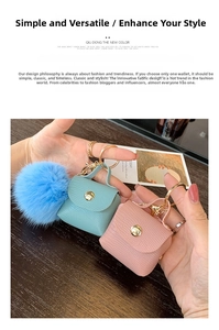 Detail of mini leather bag keychain charms in pastel pink and blue with fluffy pompom