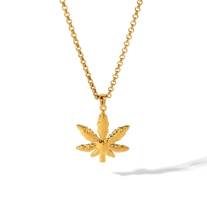 Gold stainless steel necklace featuring a detailed seven-point leaf pendant on white background