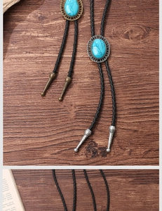 Detail of vintage turquoise bolo ties with gold and silver frames on braided leather cord