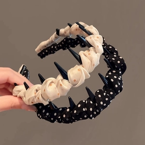 Chic polka dot padded headband set in black and beige, styled for high skull crown look