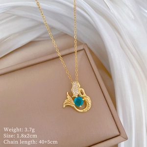 Detail of mermaid necklace with blue-green gemstone, weight 3.7g and size 1.8x2cm