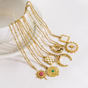 Set of seven 14k gold plated stainless steel necklaces with natural stone pendants