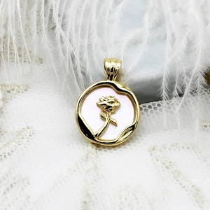 18K gold plated white shell round pendant with a 3D rose design on soft white lace