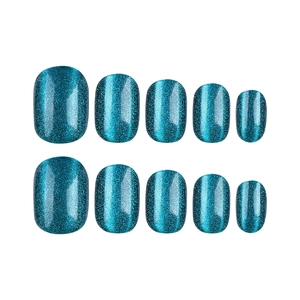 Short emerald cat-eye press-on nails set with shimmer glitter finish on white background
