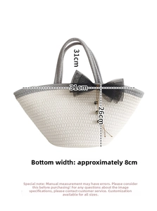 Detailed view of woven tote bag dimensions with black mesh bow and metal pendant details
