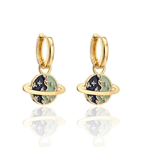 Detail of 18K gold plated globe earrings with zircons and blue enamel Earth design