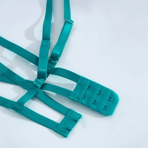 Detailed macro view of the three-row hook closure and adjustable strap in teal blue lace
