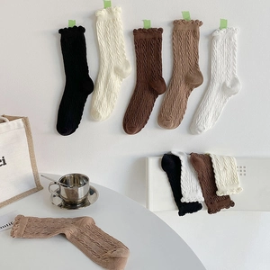Women's autumn ruffle trim cable knit mid-calf socks in various neutral earthy colors