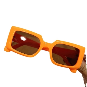 Retro orange rectangle sunglasses with thick glossy frames and brown lenses for women