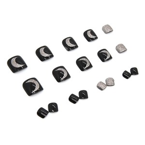 Sparkly night sky black and silver glitter press-on toenails for a modern fashion look