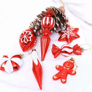 7-piece red and white Christmas ornament set with candy, stars, and gingerbread man shapes