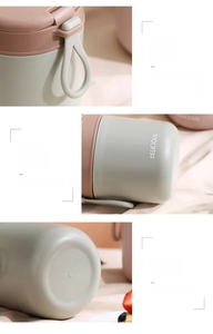Detail view of portable stainless steel soup cup with ergonomic handle and non-slip base