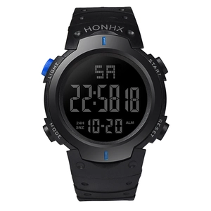 Macro shot of negative display interface and blue side button on black sports digital watch